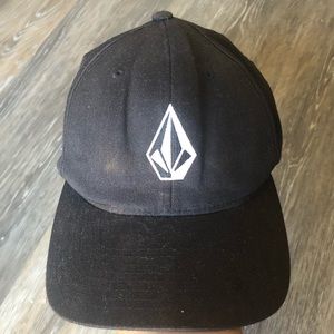 Black Volcom hat.